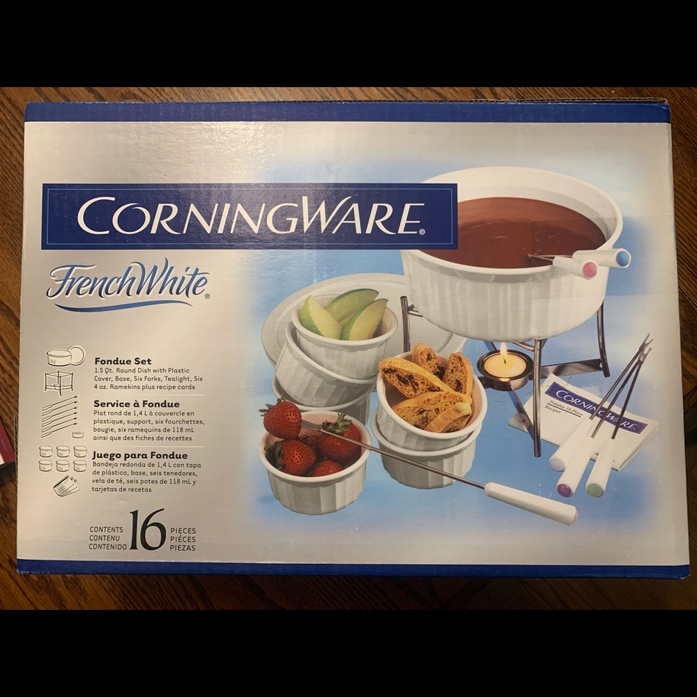 Corningware white fondue set. No chips or scratches. Used one time.